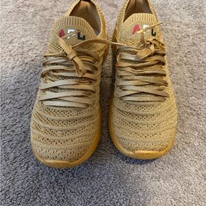 APL Metallic Gold Knit Sneakers